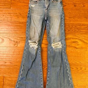 American Eagle Outfitters Super high rise flare Light Blue Distressed  Jeans‎